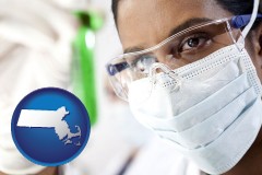 massachusetts map icon and an environmental testing lab technician
