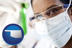 oklahoma map icon and an environmental testing lab technician